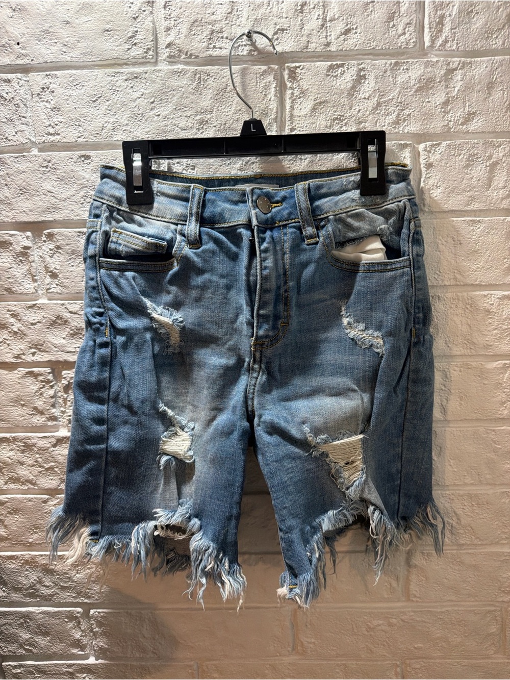 Women’s Distressed Light Blue Denim Shorts